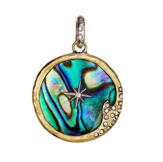 The Sea is Always Home Abalone by Waxing Poetic: A round pendant with iridescent abalone shell, gold-edged border, sterling silver star in the center, and a crystal-accented crescent moon.