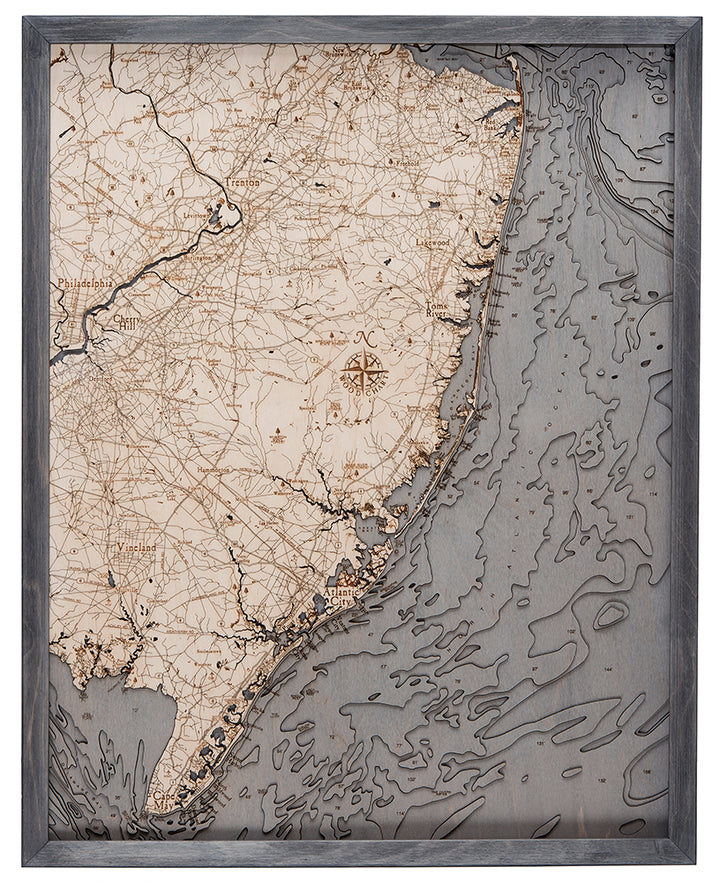 The WoodChart NJ Full Shore 24.5 x 31 Grey Frame displays a framed, vintage-style map of southern New Jersey, featuring detailed land features, roads, coastline, Atlantic City, Cape May, and part of the Atlantic Ocean.