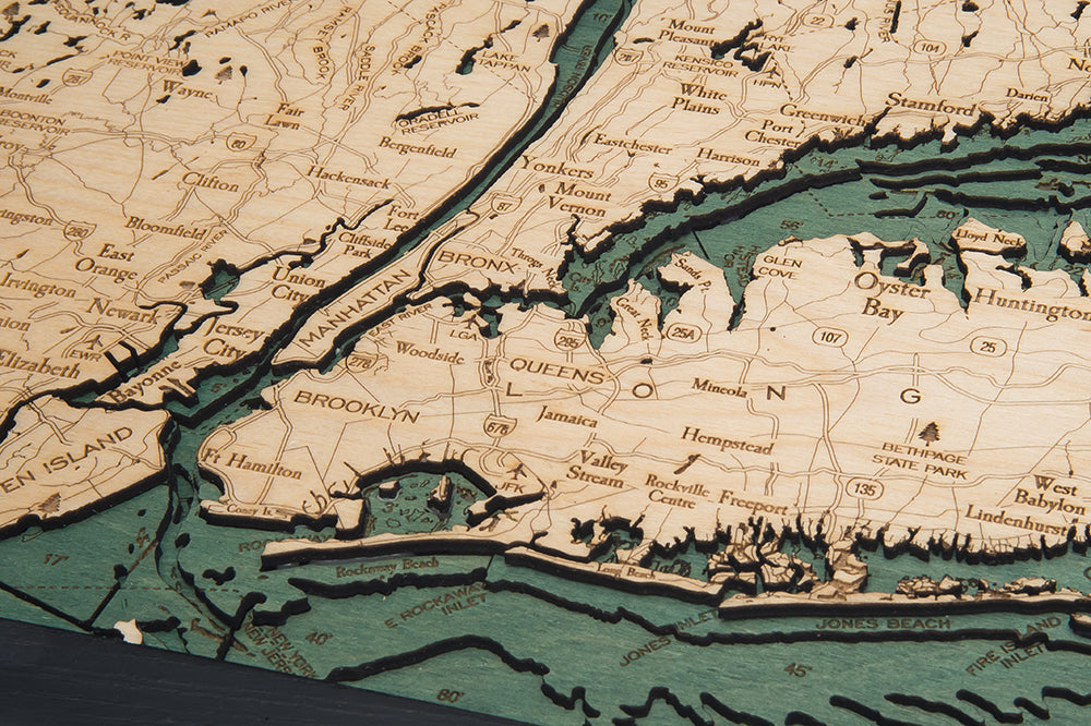 The WoodChart Long Island Sound 13.5" x 31" Black Frame is a detailed, carved wooden map highlighting Manhattan, Brooklyn, Queens, the Bronx, Long Island and surrounding waterways with labeled place names.