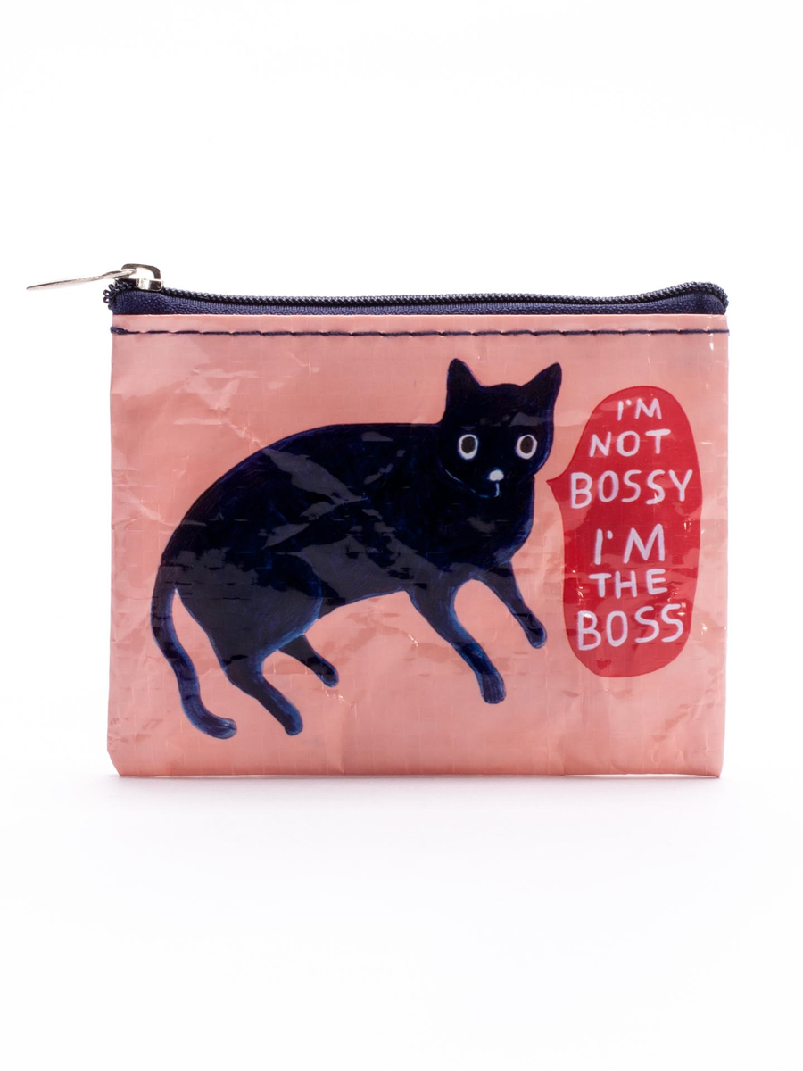 Introducing the I’M NOT BOSSY, I’M THE BOSS COIN PURSE by Blue Q—a delightful pink pouch made from recycled material. Measuring 3" high by 4" wide, it showcases a playful illustration of a black cat with a speech bubble announcing, "I'm not bossy, I'm the boss.