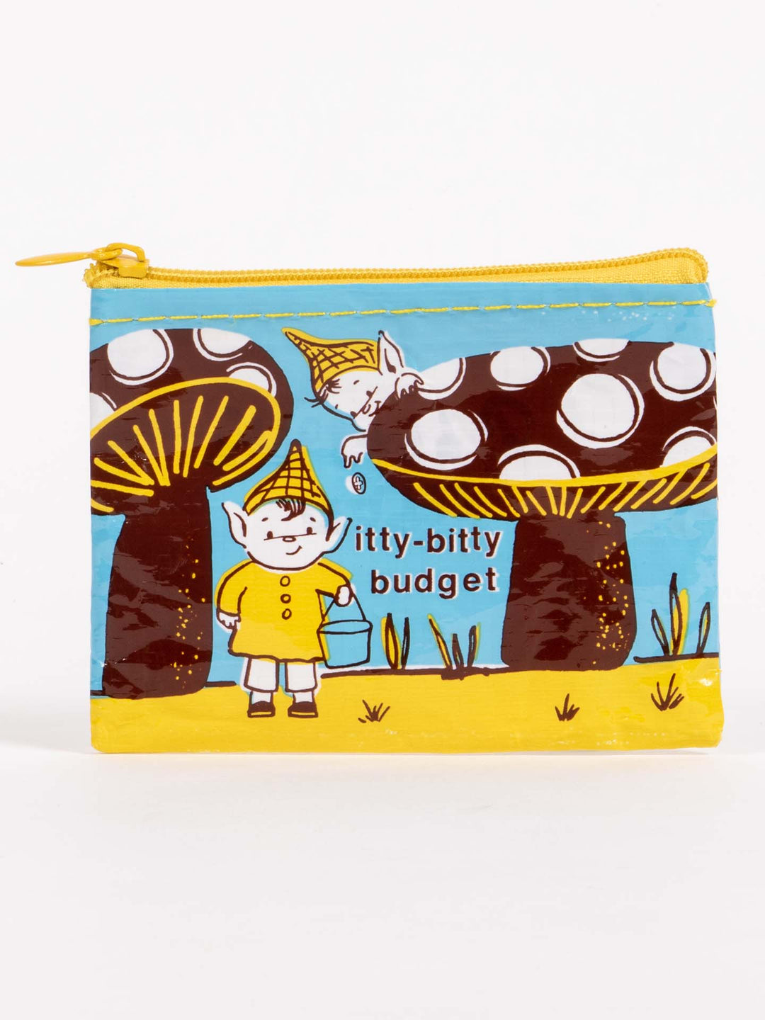 The "Itty Bitty Budget" coin purse by Blue Q features a charming illustration of a gnome clad in a yellow outfit and pointed hat, standing beside two large mushrooms. With its yellow zipper and text that reads "itty-bitty budget," this small purse is crafted from recycled material. The background includes a blue sky with green grass and tasteful yellow accents.