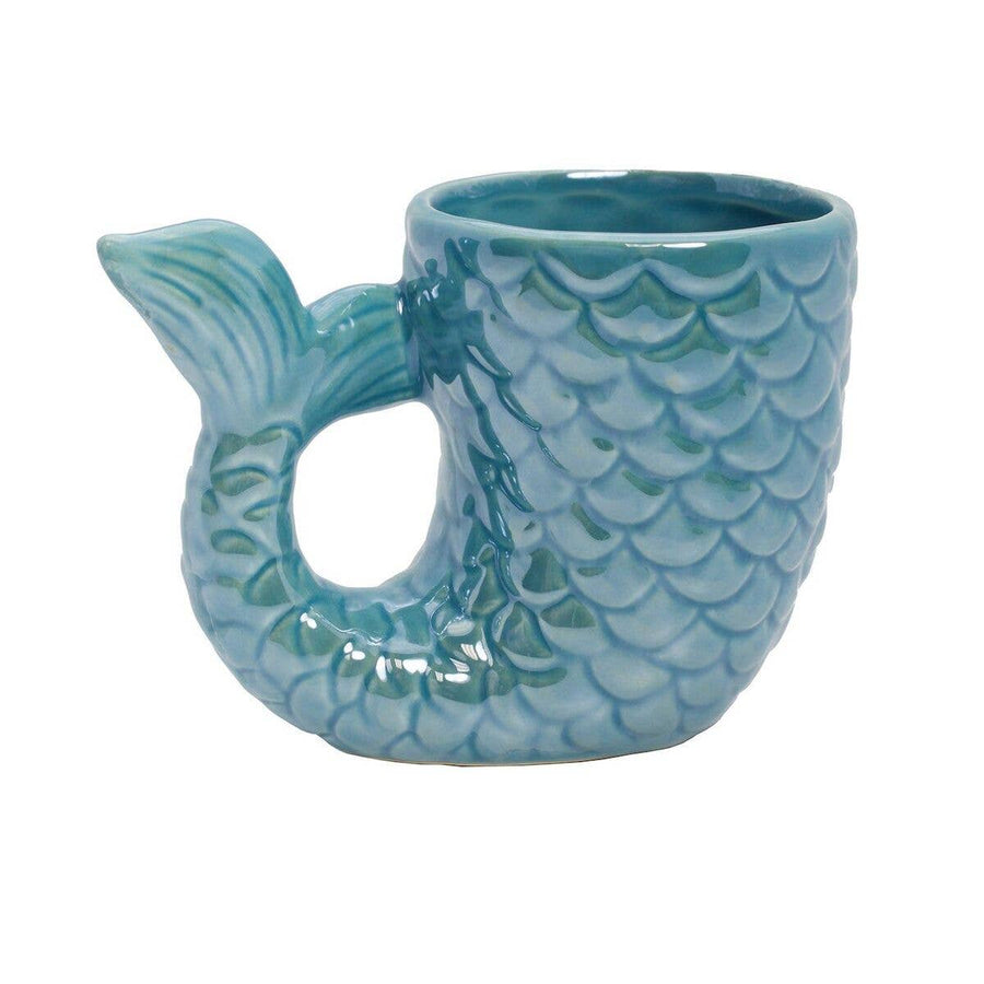 Discover the delightful Streamline Mermaid Tail Mug, a whimsical blue ceramic creation with intricate scale detailing. The handle, designed as a charming tailfin, enhances its enchanting look. Be sure to review the dimensions to ensure it fits seamlessly into your collection.