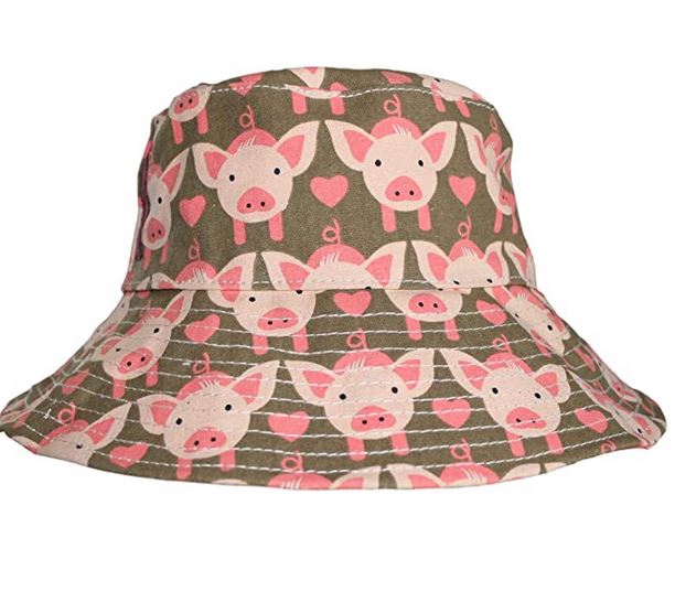 Introducing the Beach Hat Pig by Bungalow 360: a reversible beach hat adorned with delightful cartoon pig heads and pink hearts. Featuring an olive green background, the playful design emphasizes white-faced pig heads with charming pink accents. This whimsical hat is perfect for sunny days and makes a unique, packable accessory showcasing one-of-a-kind patterns.