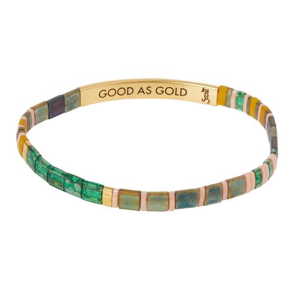 The Scout Jewelry Miyuki Good As Gold Forest Gold bracelet features square beads in green, gold, and brown with a 14K gold-dipped "GOOD AS GOLD" bar. Crafted on a stretch cord, it blends fashion and function beautifully.