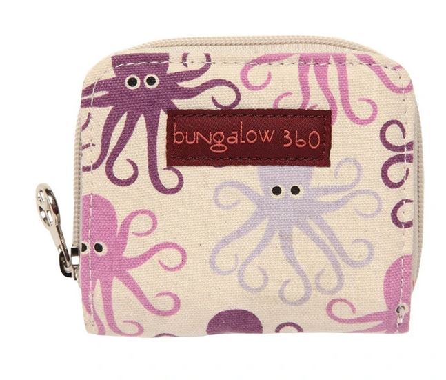 The Bill Fold Wallet Octopus, offered by Bungalow 360, is a beige vegan cotton canvas wallet featuring unique designs of playful octopuses in shades of purple and pink. It includes a zipper and a small metal clasp, with a brown label displaying "bungalow 360," and supports animal causes.