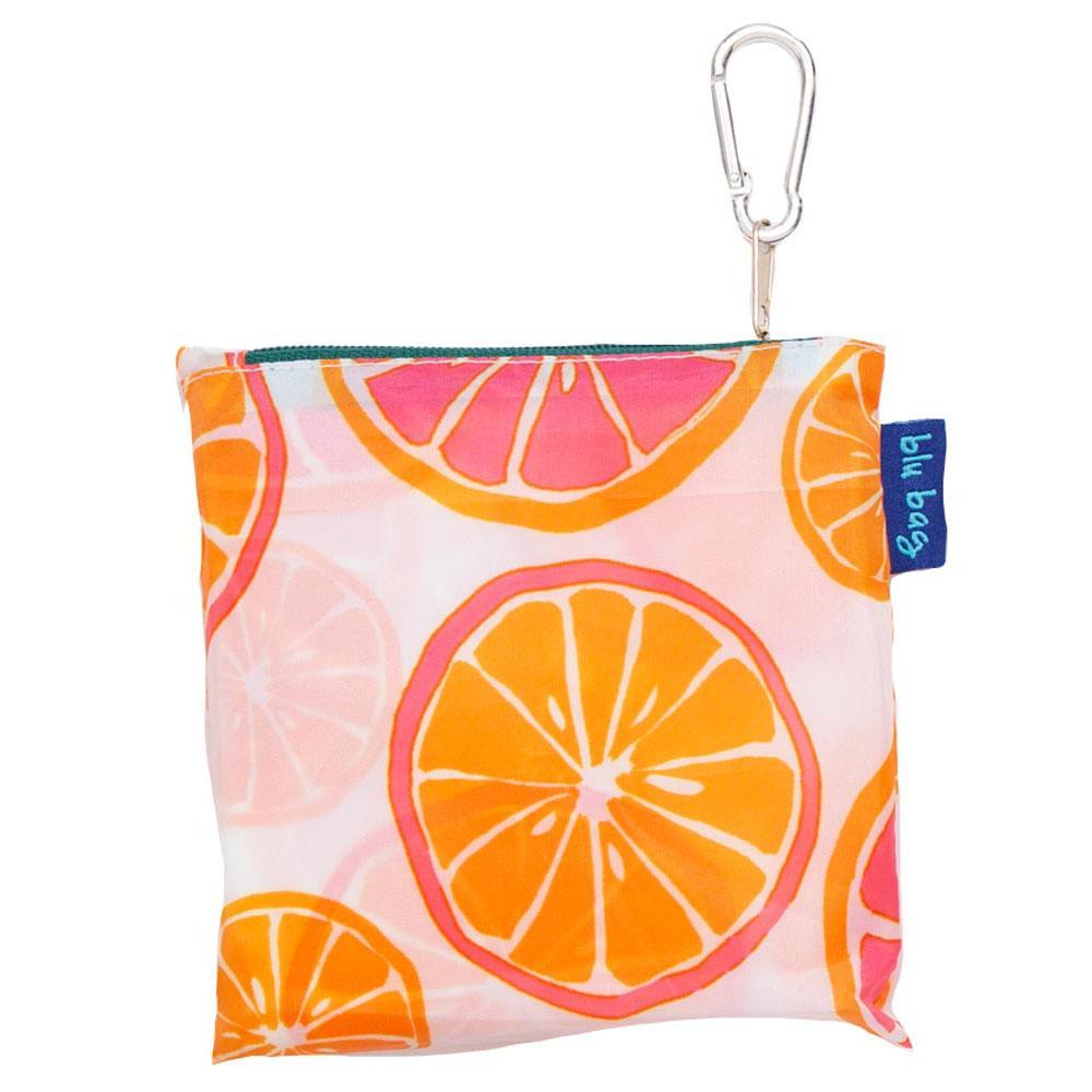 The Citrus Reusable Bag by zzzRockFlowerPaper is a compact, square pouch featuring a vibrant citrus print of orange slices on a pink background. It includes a zipper closure and a silver carabiner clip on one corner, with an eco-friendly design enhanced by a blue "bkr bag" tag on the side.