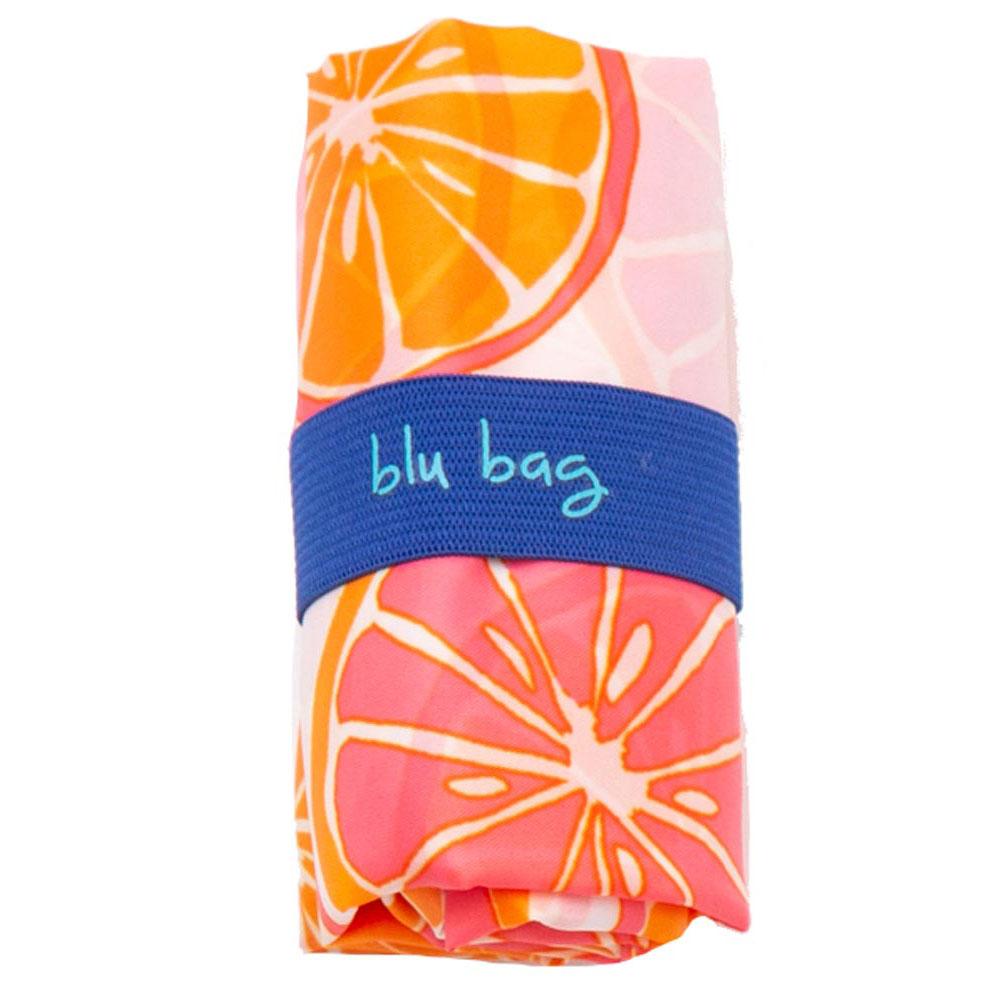 The Citrus Reusable Bag from zzzRockFlowerPaper, featuring vibrant orange and pink citrus fruit designs and secured with a blue band labeled "blu bag," offers an eco-friendly and stylish option for any outing.