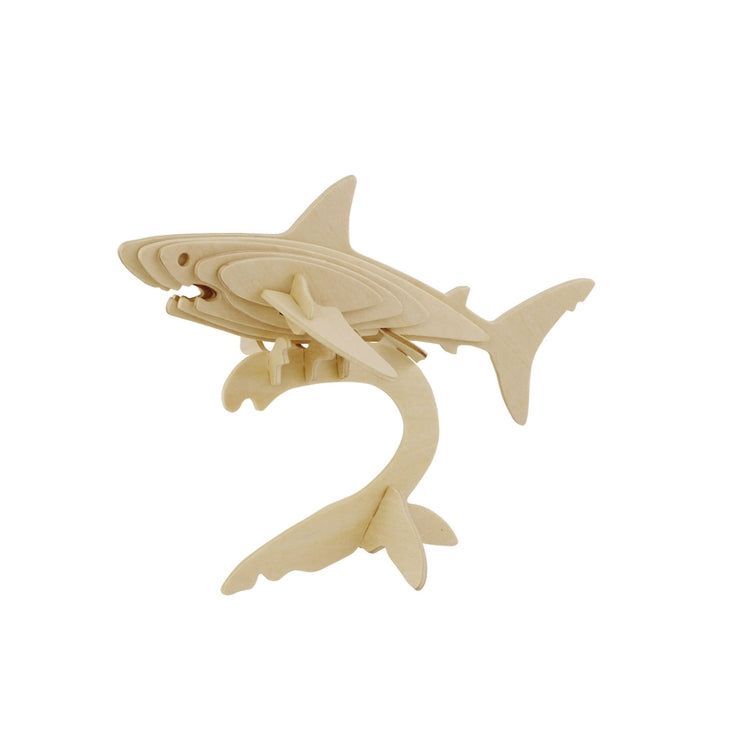 The Hands Craft DIY Shark 3D Wooden Puzzle is crafted from non-toxic plywood and features intricate, interlocking pieces that form the shark's body, fins, and tail. It remains unpainted to showcase the natural wood texture and grain, serving both as an educational tool and a creative assembly puzzle.