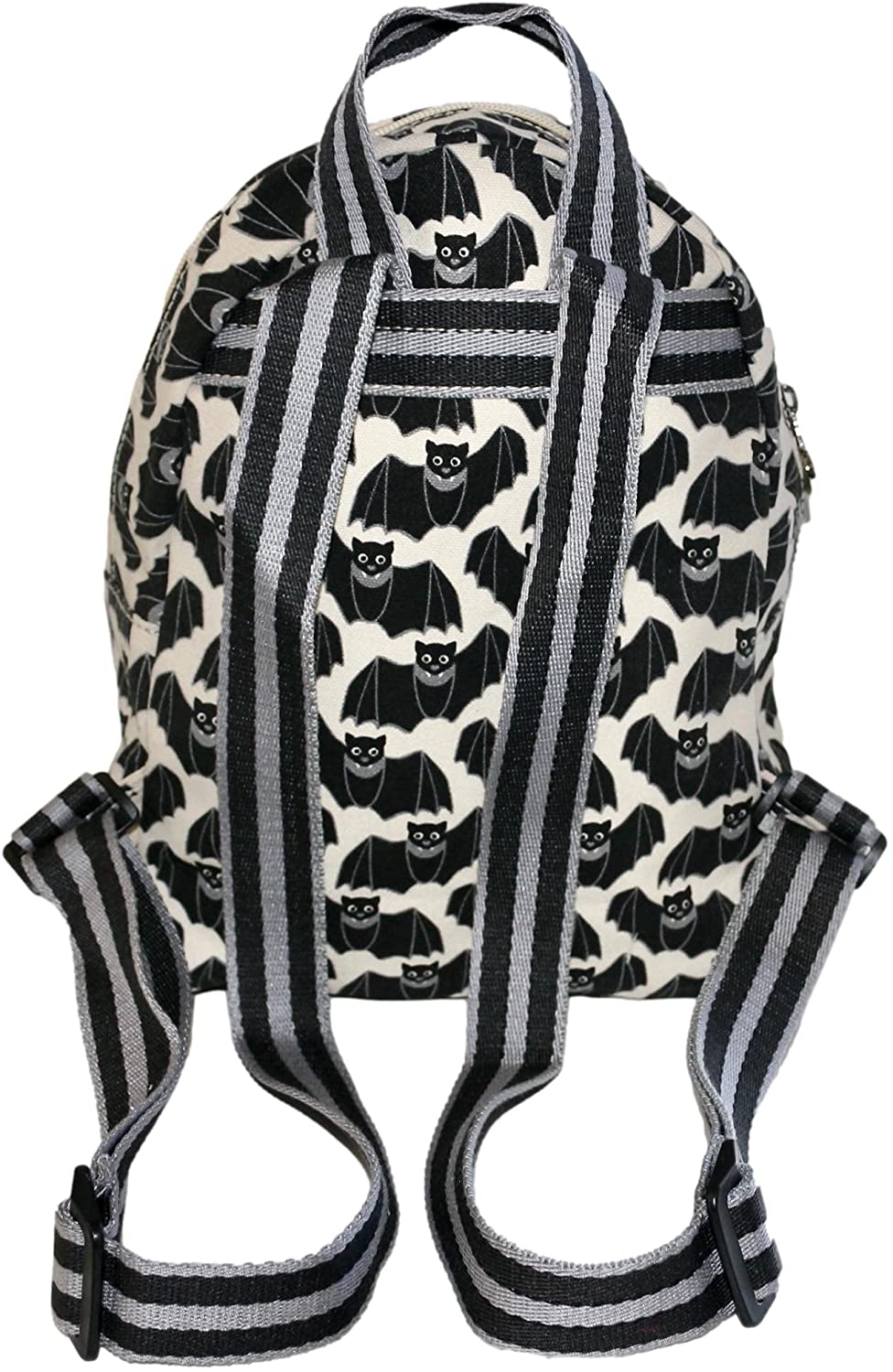 The Backpack Bat by Bungalow 360 is a small backpack made of durable cotton canvas, adorned with a whimsical black and white bat pattern. The bag features wide black and white striped straps and a matching grab handle at the top. The bats are illustrated with smiling expressions and spread wings, embodying unique designs tailored for you.