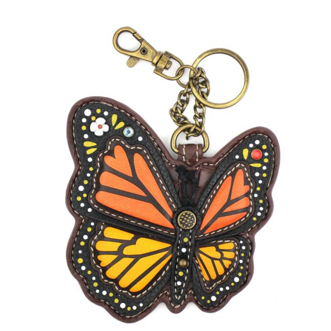 Introducing the Monarch Keychain by Chala – a butterfly-shaped key fob showcasing an intricate design. The butterfly's wings are beautifully adorned in orange with yellow accents and black outlining, complemented by colorful beads and small white, red, and yellow embellishments. It features a brass keyring and clasp for easy attachment.