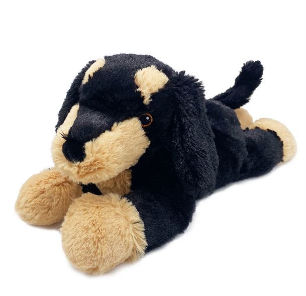 The Dachshund Warmie by Warmies is a plush toy dog with black and beige fur, floppy ears, and a short tail. Its soft, cuddly design is filled with French Lavender for soothing warmth when microwaved.