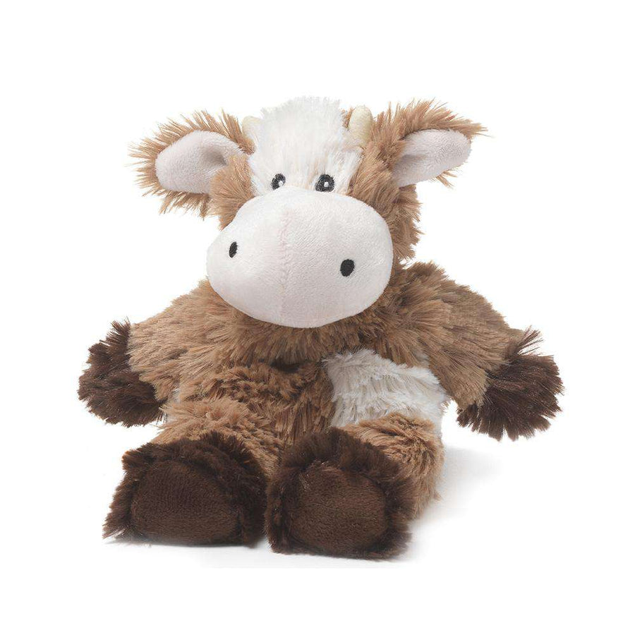 The Cow Junior Warmies by Warmies features a plush toy cow with a fluffy brown and white body, large white snout, small black eyes, and short brown horns. Infused with French Lavender, this adorable Cow Warmies Junior is designed for hugging and cuddling and is safe for all ages.