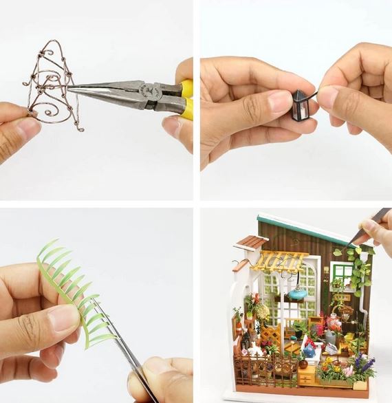 Four-part collage showcasing crafting stages from the Hands Craft Millers Garden DIY Miniature Kit. Top left: hands using pliers to bend wire. Top right: hands holding a small, black cylindrical object. Bottom left: hands cutting green paper into thin, leaf-like strips. Bottom right: a detailed, colorful tiny dollhouse garden diorama.