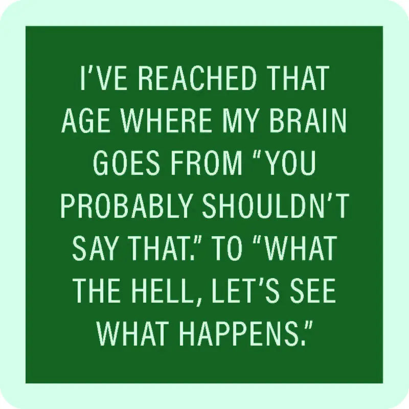 A Drinks On Me "shouldent say that coaster" features a green square with white capital letters that read, "I'VE REACHED THAT AGE WHERE MY BRAIN GOES FROM 'YOU PROBABLY SHOULDN'T SAY THAT' TO 'WHAT THE HELL, LET'S SEE WHAT HAPPENS.'" The text is centered on the coasters which have a resin finish and cork backing.