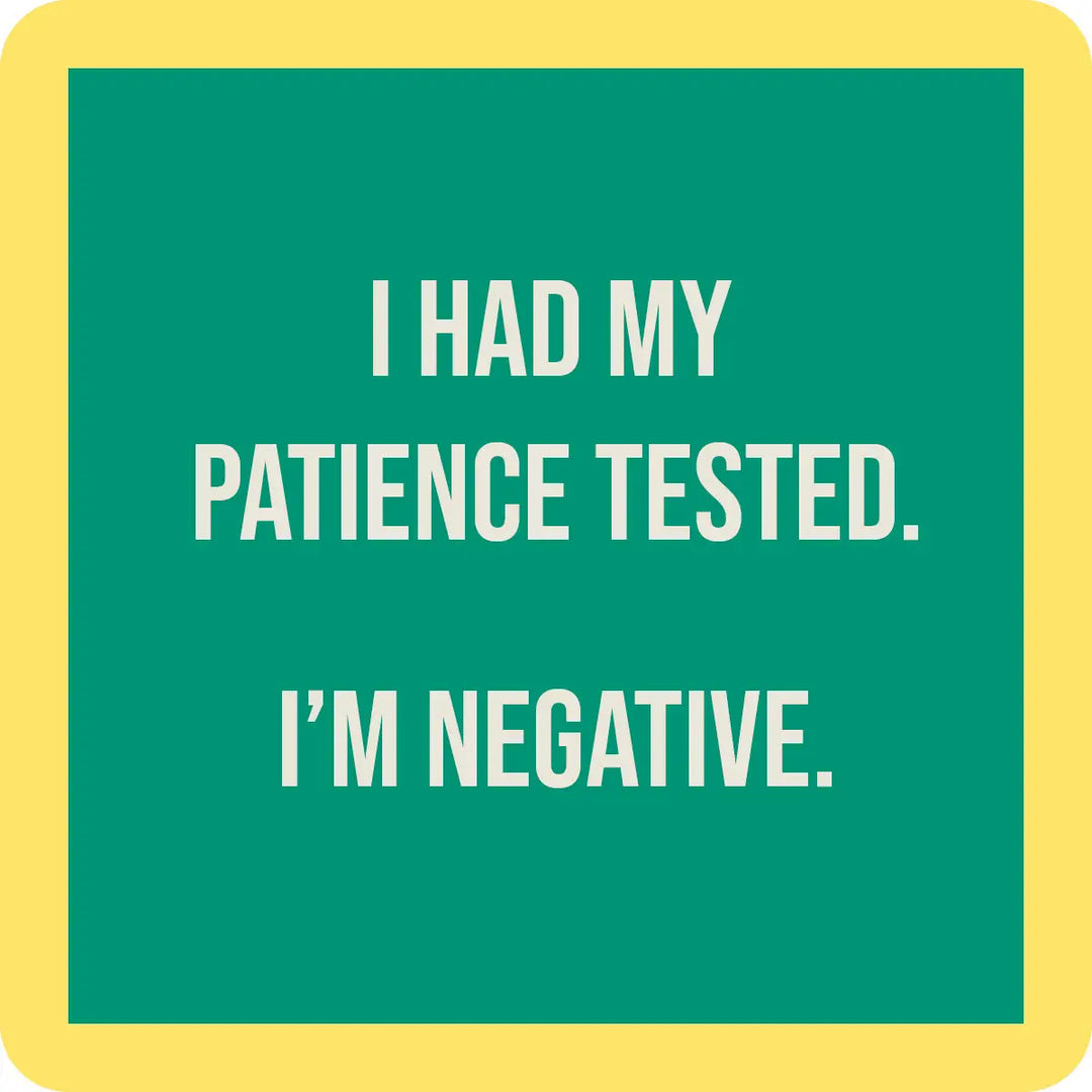 A green square with rounded corners is bordered by a thick yellow frame, reminiscent of our "I had my patience tested" resin coasters from Drinks On Me. In the center, white text reads, "I HAD MY PATIENCE TESTED. I'M NEGATIVE." Proudly made in the USA.