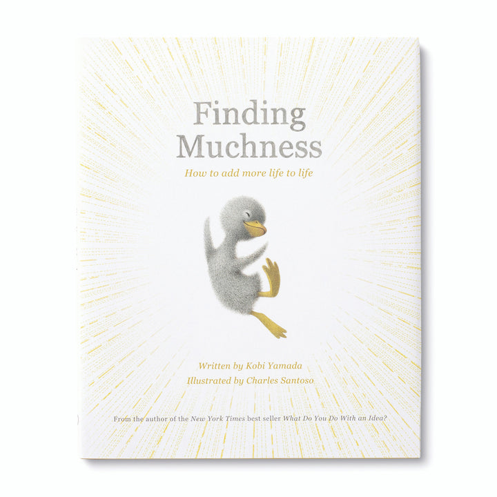 A Compendium book cover titled "Finding Muchness" presents a heartwarming illustration by Charles Santoso, featuring an enthusiastic duckling jumping, surrounded by radiating lines of hope and joy. The story is authored by Kobi Yamada.
