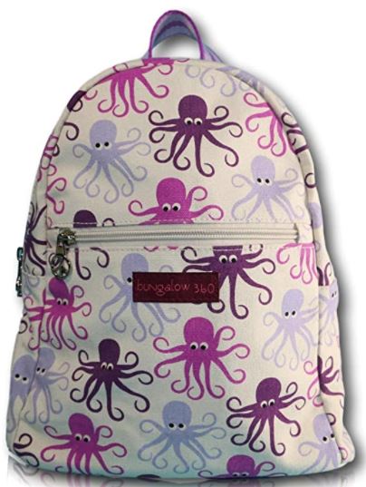 The "Backpack Octopus" by Bungalow 360 is a vegan bag made from durable cotton canvas, featuring a vibrant octopus pattern in shades of purple and lavender on a light background. It includes a front zipper pocket with a brown label that reads "Bungalow 360," along with a top carrying handle and adjustable straps.