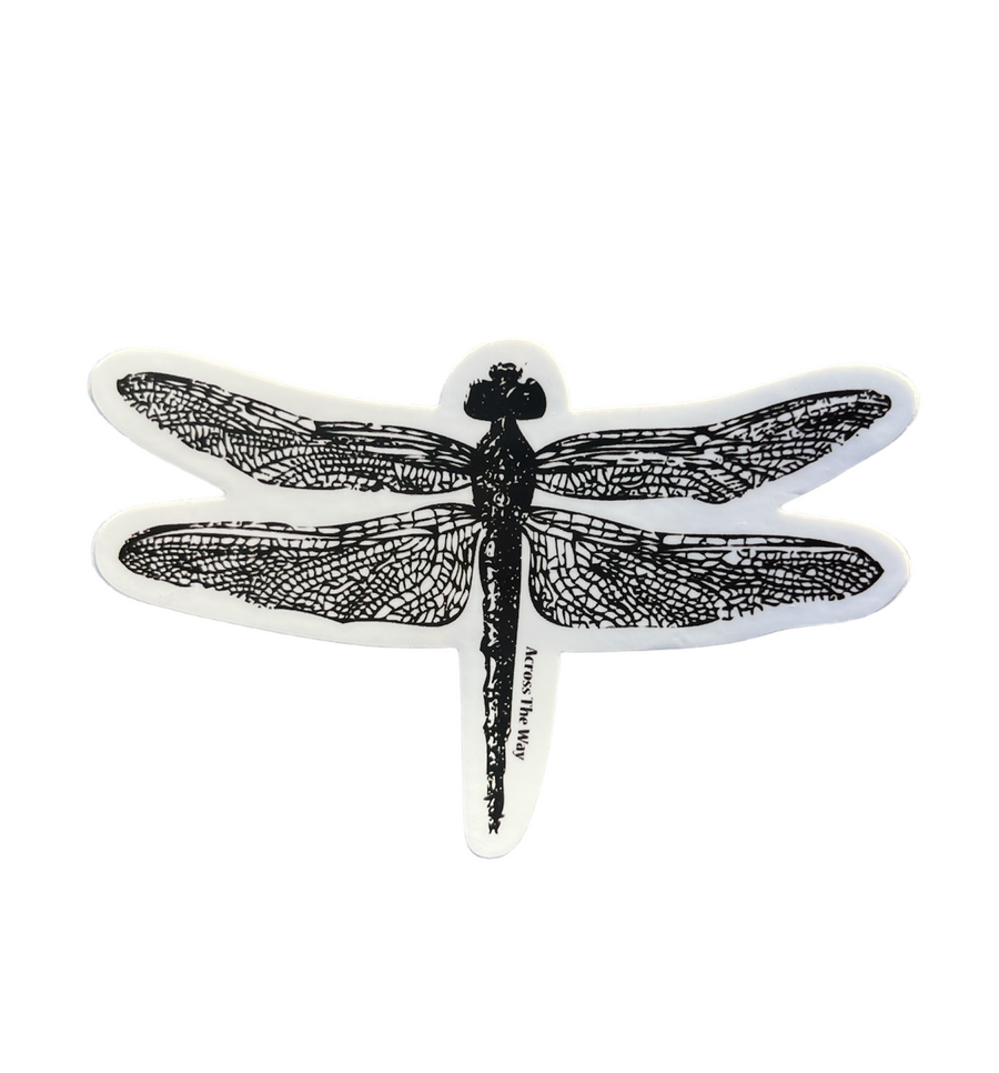 Product Description: The Dragonfly Sticker by StickerMule features an intricate illustration of a black dragonfly with detailed, lace-like wing patterns set against a white background. This stylized design is often associated with symbols of change and transformation.