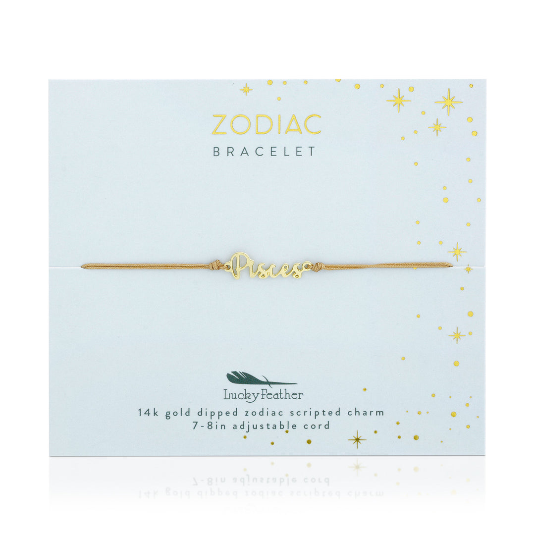 The LuckyFeather Zodiac Bracelet Pisces is a delicate piece featuring a "Pisces" charm in gold script, placed on a card adorned with gold stars and small dots. This 14k gold-dipped, nickel-free zodiac bracelet boasts an adjustable cord (7-8in) for the perfect fit.