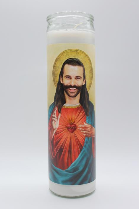 The BOBBYK BOUTIQUE Queer Eye Jonathan Van Ness Candle is an unscented celebrity shrine candle depicting a modern figure with long hair and a beard, styled like a sacred saint in a luminous robe with a heart emblem and halo.