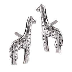 The Giraffe Silver Stud by Welman is a pair of sterling silver earrings featuring a dotted texture in a giraffe shape, ideal for adding a whimsical touch while being mask friendly.