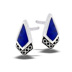 The Lapis Diamond Filigree Silver Stud earrings by Welman are crafted from sterling silver and feature elegant blue enamel with black circular accents at the base. Their sleek design ensures comfort while wearing face masks, without compromising style.