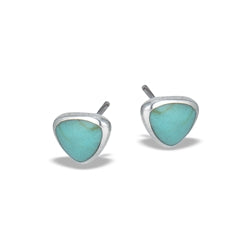 Welman's Turquoise Triangle Silver Stud earrings feature turquoise-colored, triangular-shaped studs with sterling silver borders. The earrings boast a smooth, polished surface and are displayed against a white background, casting subtle shadows. These mask-friendly accessories add a touch of elegance to any outfit.