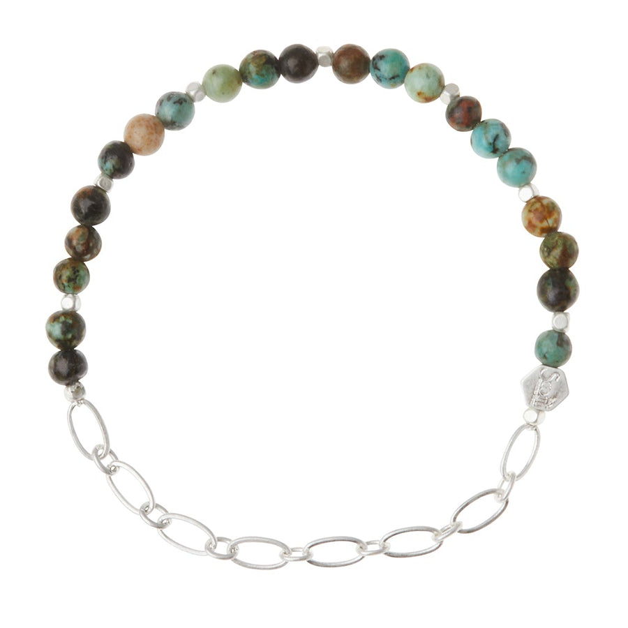 The Scout Jewelry Chain Bracelet African Turq/Silver features multicolored semi-precious gemstones, a silver chain section, and an engraved hexagonal charm.