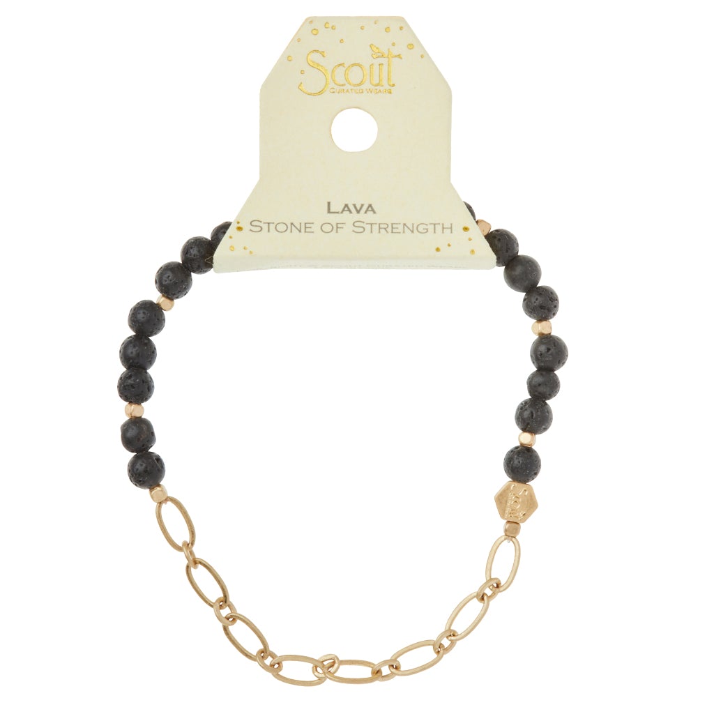 A bracelet named "Chain Bracelet Lava/Gold" features black lava beads, a logo bead, and sophisticated paperclip chain links. The label displays "Scout Jewelry" and states "Lava, Stone of Strength.