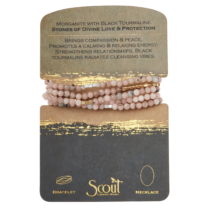 A jewelry card featuring the Stone Wrap Morganite/Blk Tourmaline bracelet by Scout Jewelry displays: "Morganite with Black Tourmaline. Stones of Divine Love & Protection. Promotes compassion & peace.