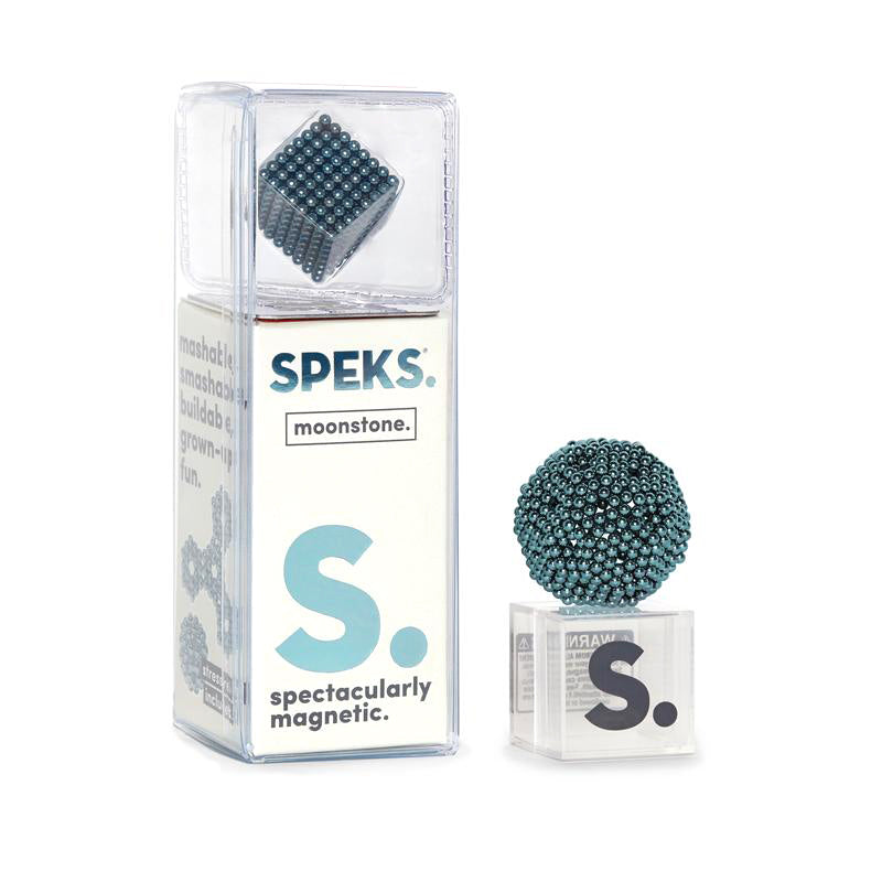 A package of 512 Moonstone Speks by SPEKS contains a cube and a sphere made from neodymium magnetic balls, all cleverly packaged in transparent casing with blue and black text, making it an enjoyable desk toy for adults and a striking accessory.