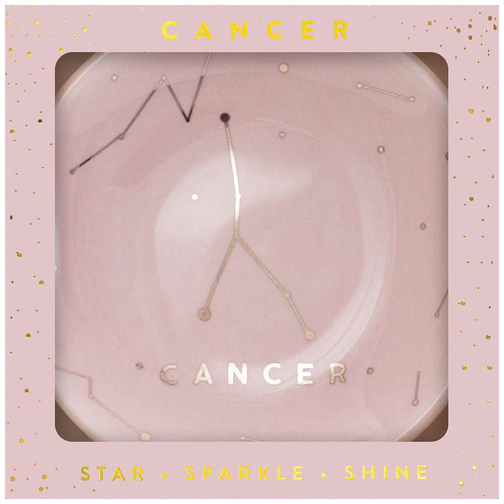 This LuckyFeather Dish Cancer showcases a pink plate decorated with the Cancer constellation and the word "CANCER" in gold. The light pink border is enhanced with gold accents and includes the words "STAR • SPARKLE • SHINE". It's an ideal choice for protecting your jewelry.