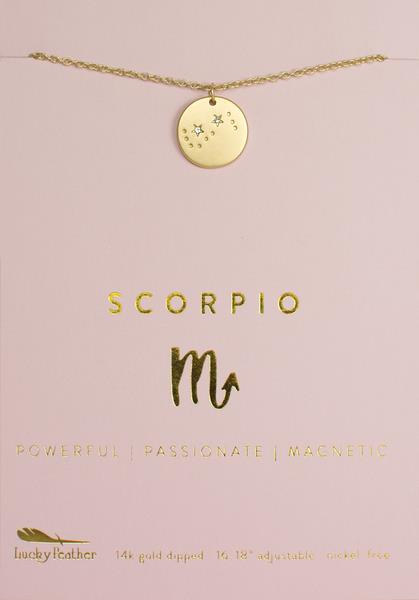 Introducing the LuckyFeather Zodiac Necklace Scorpio: a delicate gold necklace showcasing a circular pendant adorned with the Scorpio astrological symbol and stars. Set against a soft pink background, the pendant proudly displays "SCORPIO" along with descriptors "POWERFUL | PASSIONATE | MAGNETIC" in elegant gold text.