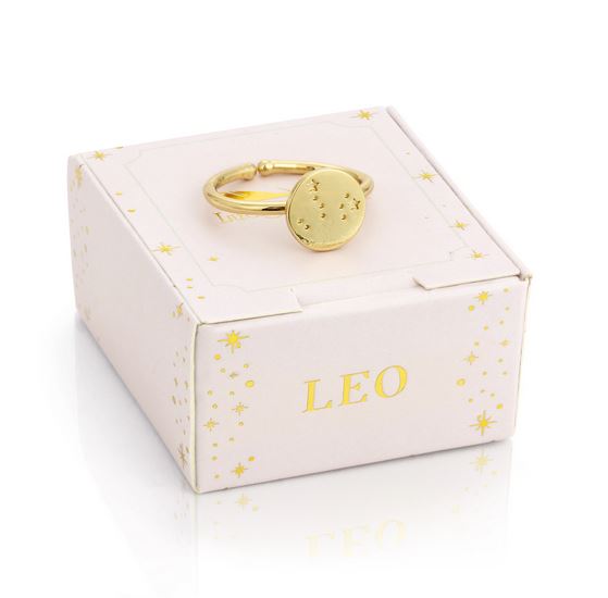 The captivating Leo Signet Ring by LuckyFeather showcases the Leo constellation on a round face, elegantly displayed on a white box embellished with gold stars and the word "LEO" in shining letters. This 14k gold-dipped piece features an adjustable band, making it an ideal fit for any celestial enthusiast.