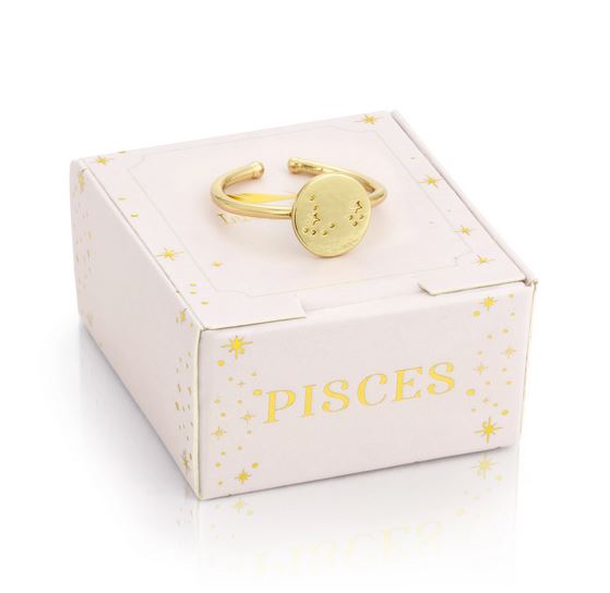 A LuckyFeather Pisces Signet Ring, showcasing a gleaming zodiac symbol, rests elegantly on a white box adorned with tiny golden stars and the word "Pisces" in lustrous letters. This exquisite piece boasts an engraved constellation design and comes with an adjustable band for the ideal fit.