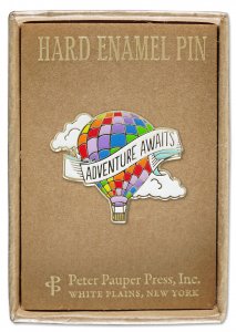 The Adventure Awaits Balloon Pin from PeterPauperP is a vibrant hard enamel pin showcasing a hot air balloon adorned with a rainbow pattern. The balloon features a banner that reads "Adventure Awaits." The pin comes presented on brown cardboard backing and is packaged in a gift box labeled with "Peter Pauper Press, Inc., White Plains, New York.