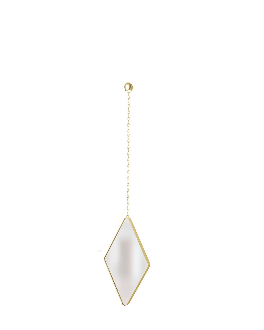 A single Diamond Mirror Brass earring by Umbra elegantly hangs from a delicate chain. Its smooth, mirror-like surface adds sophistication to a minimalist decor against the plain white background.