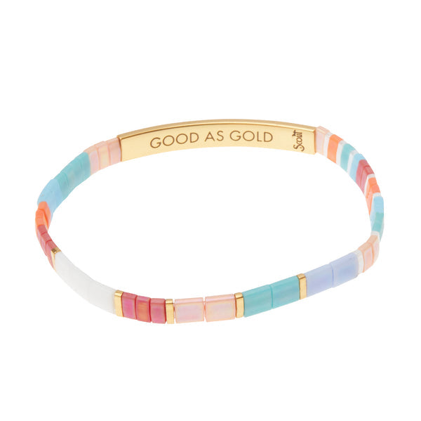 Introducing the Miyuki Good As Gold Bracelet by Scout Jewelry: a vibrant beaded bracelet adorned with square beads in shades of pink, blue, white, and orange. The 14K Gold dipped bar prominently features the engraved phrase "GOOD AS GOLD" along with the brand logo on the side, making this piece a standout among Miyuki bracelets.