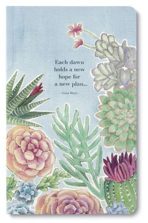 The "Each dawn holds a new hope" journal by Compendium features a vibrant cover adorned with hand-drawn succulents and flowers, complemented by modern typography. The cover beautifully displays the phrase: "Each dawn holds a new hope for a new plan." Inside, the journal offers lined pages ideal for recording your thoughts and dreams.