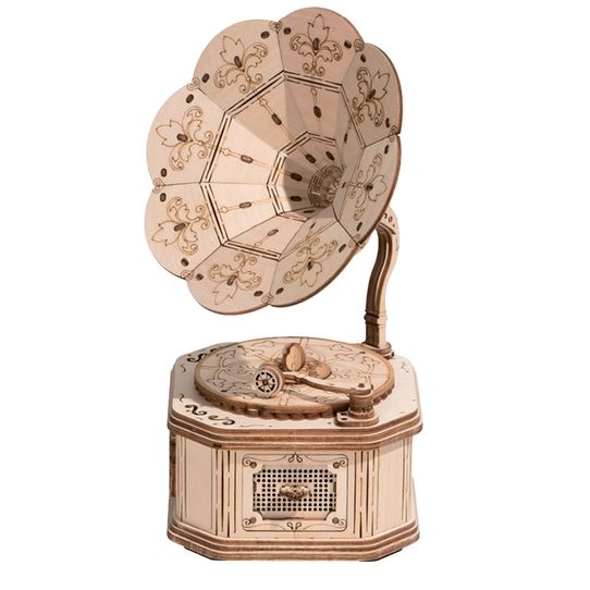 The 3D Wooden Puzzle Gramophone by Hands Craft is a modern vintage-style music box featuring intricate floral patterns on the horn and base. This light-colored piece boasts decorative etchings and a crank handle, showcasing a blend of craftsmanship and classic design.