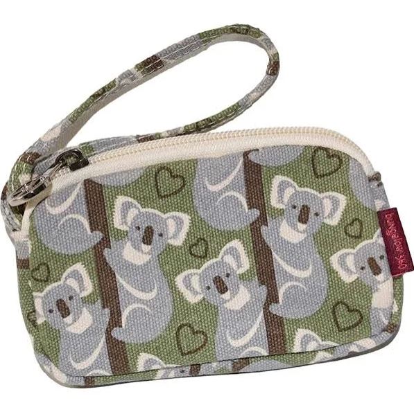 The Tiny Wristlet Koala by Bungalow 360 is a small coin purse with a wrist strap that features an adorable pattern of koalas and hearts on a green background. Made from durable cotton canvas, this purse has a zipper closure and a red tag on the side.