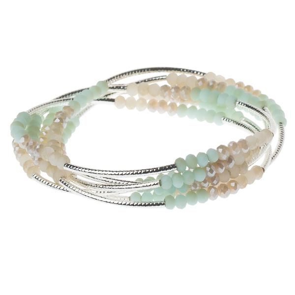 Explore the Wrap turq combo/silver - No Grit No Pearl by Scout Jewelry: a multi-strand bracelet beautifully featuring silver, turquoise combinations with light blue, cream, and white beads intricately arranged on silver wires in a layered and twisted design.