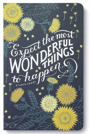 The COMPENDIUM Write Now Journal titled "Expect the most wonderful things to happen" showcases a modern typography of Eileen Caddy's quote on its cover. The dark background is adorned with yellow and green flowers, scattered leaves, and dandelion seeds in a beautiful floral design. The notebook features lined pages for your writing needs.